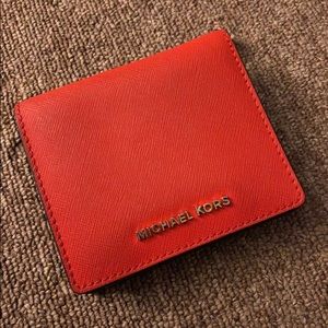 Orange Michael Kors wallet